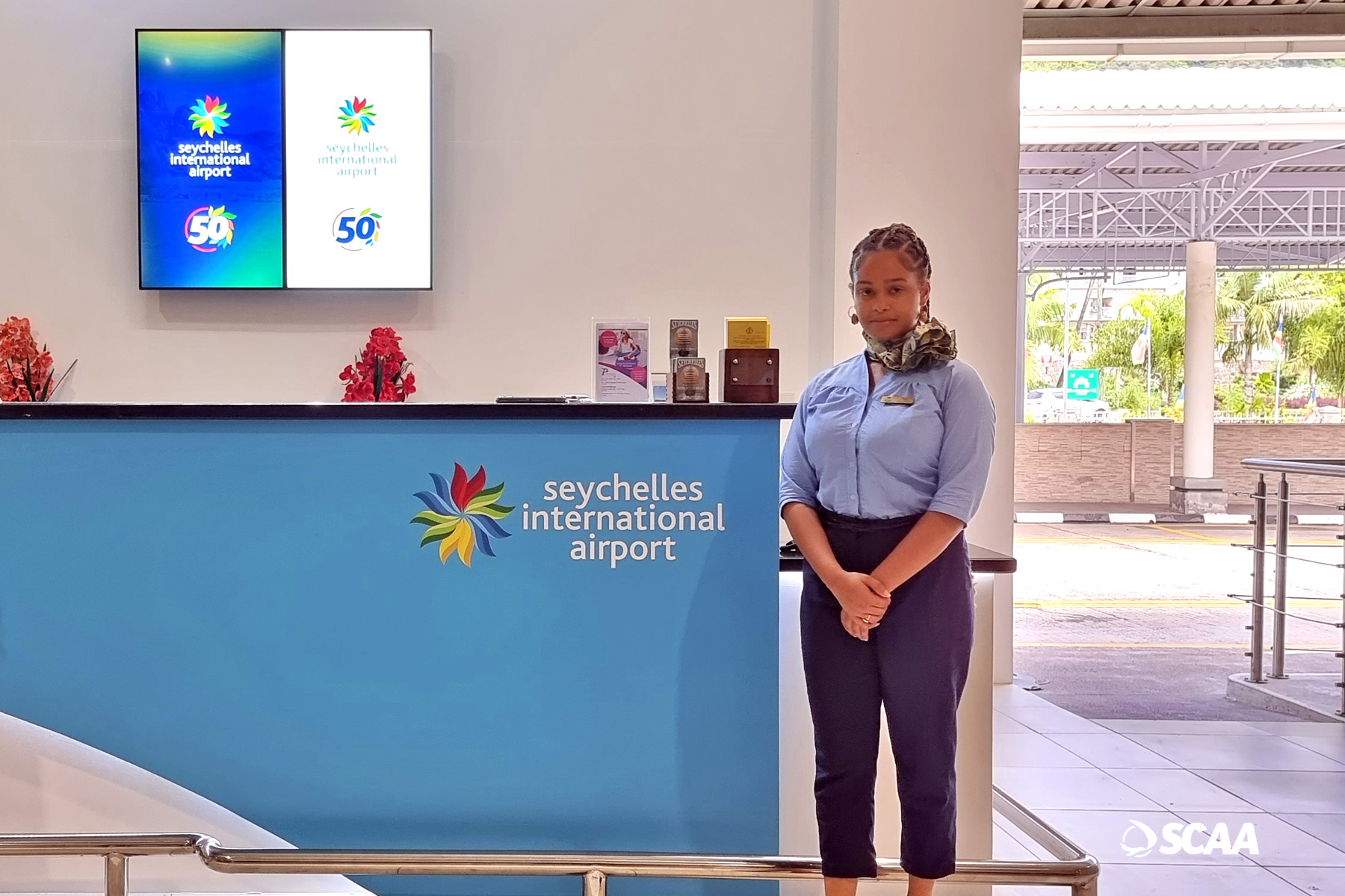 Customer Services Officers in their new attire at the newly branded information desk on the international concourse area.